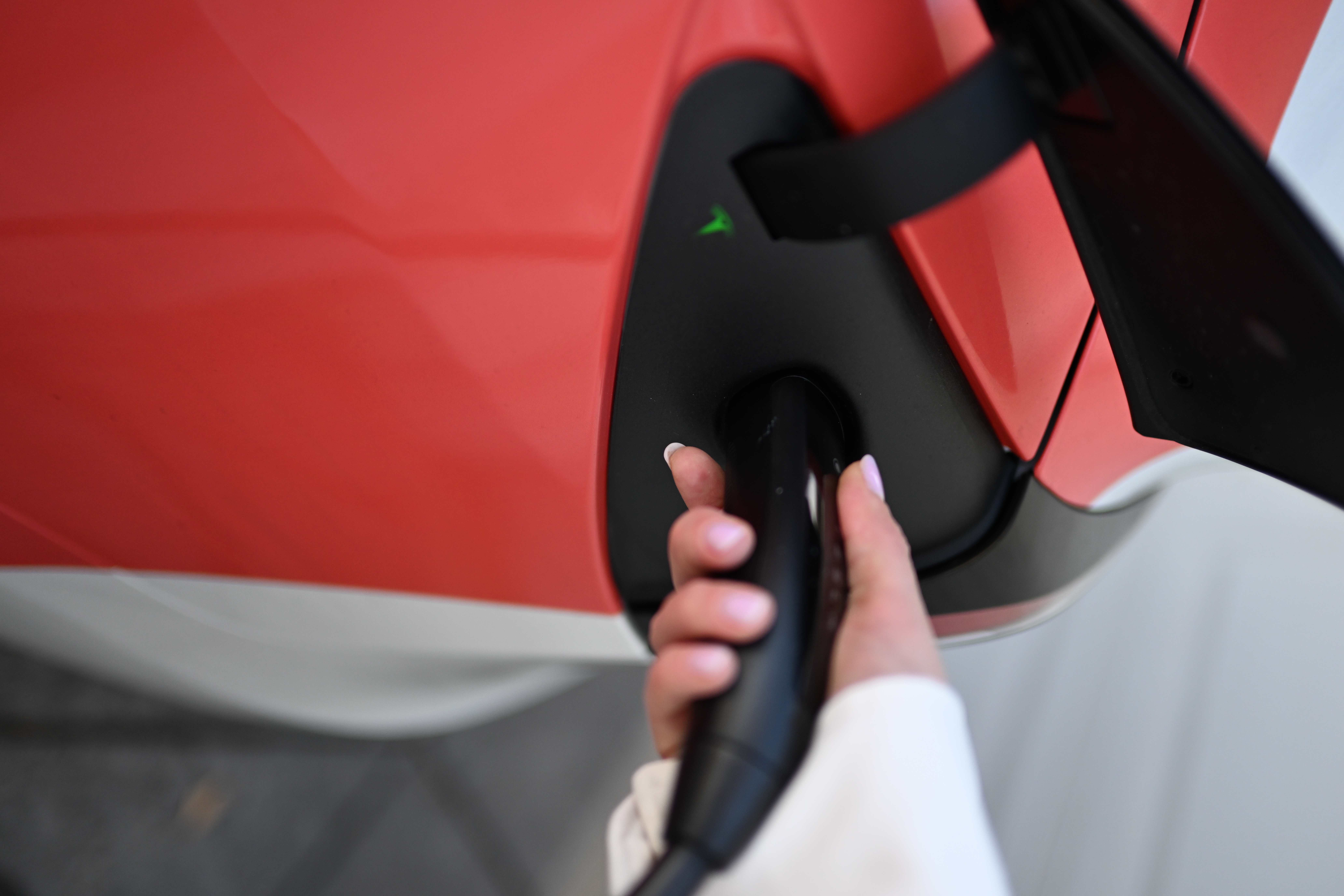 Electric_car_charger_installation.webp